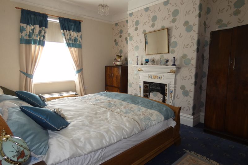 Bedroom One- click for photo gallery